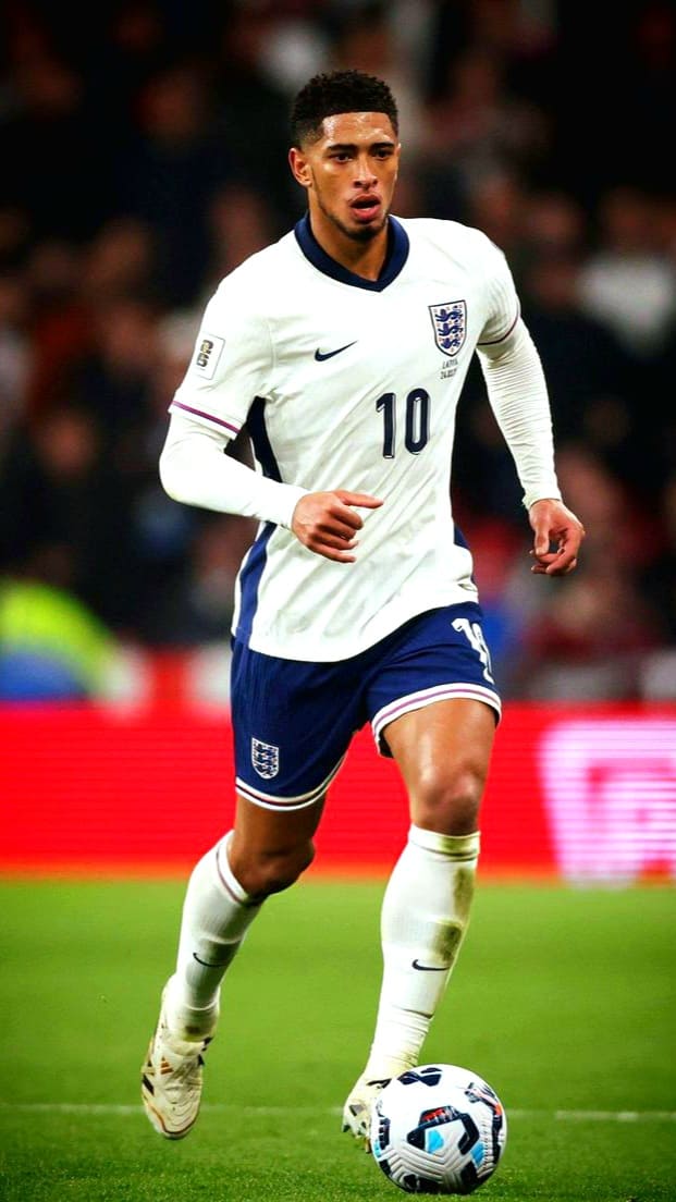 A soccer player in an England jersey with number 10 runs on the field, focusing on the ball at his feet during a match—an exciting moment you won’t want to miss when you purchase IPTV.